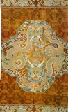 明 柿蒂龙纹织物.jpg